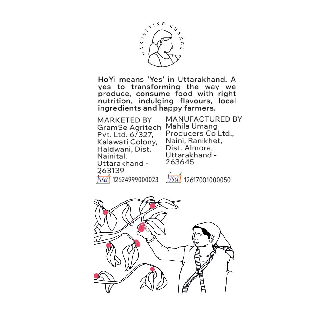 Product label with illustrations of a woman and plants, featuring text about 'Harvesting Change' and product details.