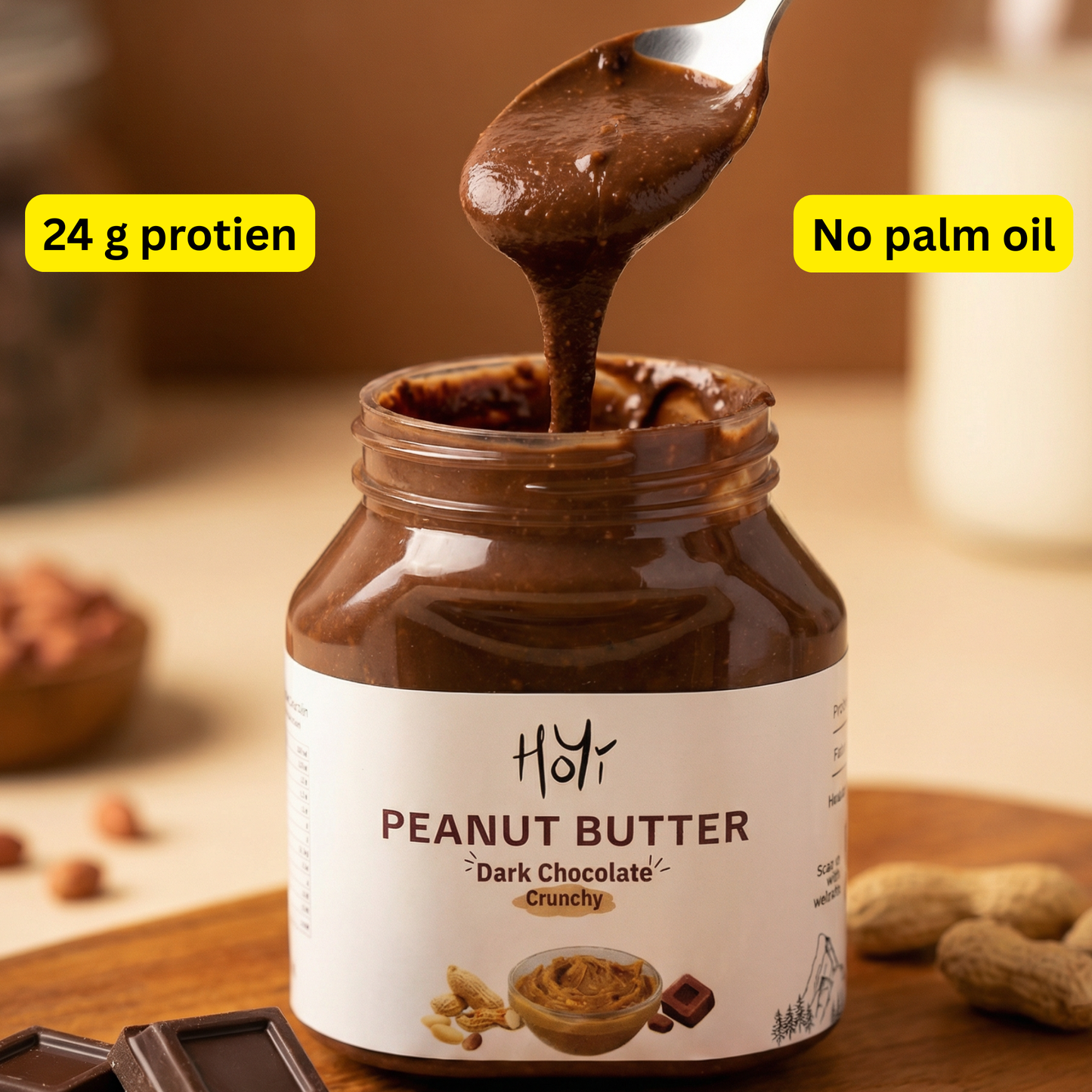 HoYi dark chocolate peanut butter jar with spoon showing creamy texture and 24 g protein per 100 g”