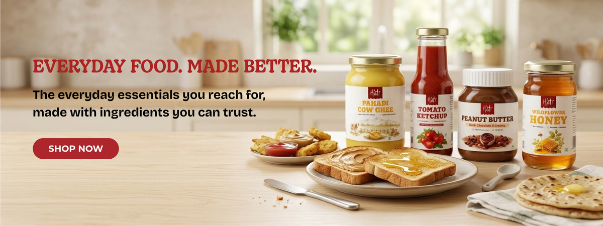 Handmade Kumaoni chutneys and pickles from HoYi on a kitchen table with toast, ketchup and honey. Everyday food, made better. Shop now.