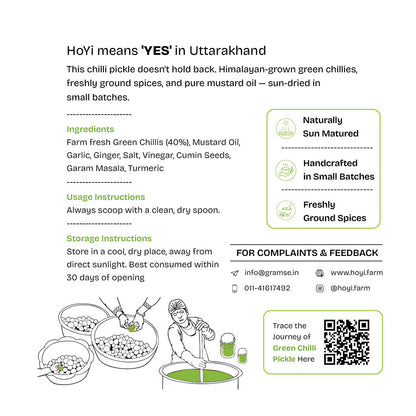 An informational product graphic for HoiYi chilli pickle on a white background. The text explains that HoiYi means 'YES' in Uttarakhand, describes the ingredients and preparation, includes usage and storage instructions, and provides contact details and a QR code.
